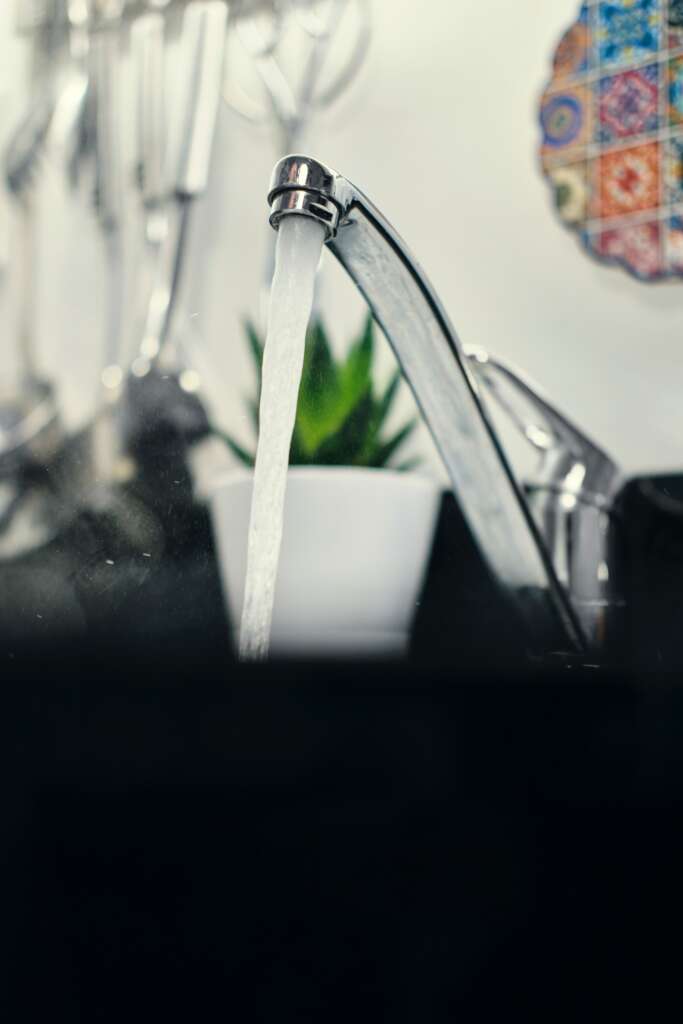 kitchen faucet flowing water