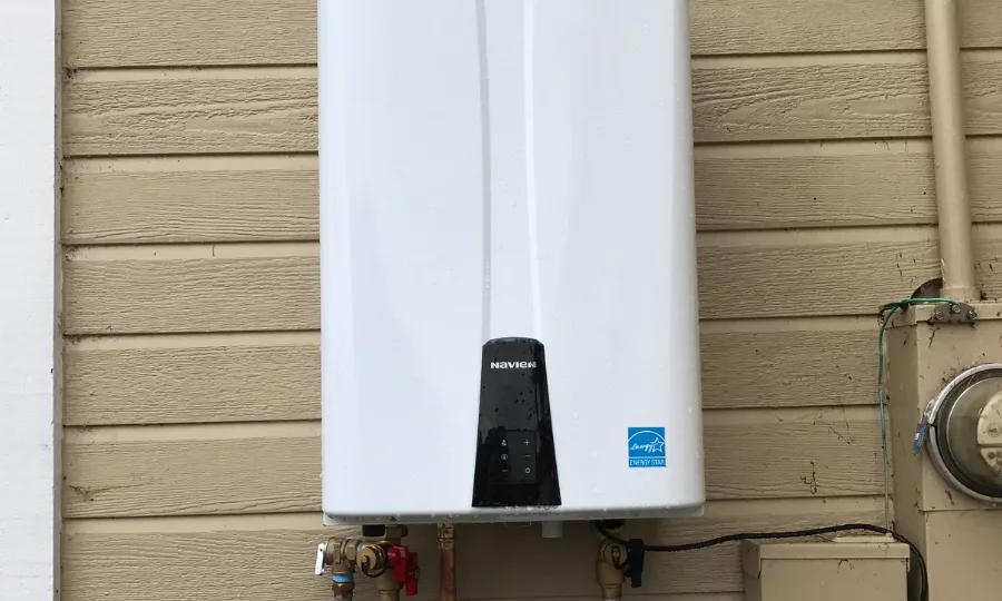 White Tankless Water Heater on The Outside Of A Home